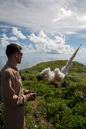 Sgt. Korey Norman, quality assurance safety observer with Marine Aerial Refueler Squadron 152, launches a GTR-18 missile, better known as a "Smokey SAM," during a threat reaction evolution on an island outside of Okinawa, Japan, Aug. 26, 2014. The threat reaction evolution is a chance for pilots to stay up to date on their qualifications while keeping an alert and aware mindset for any arising combat scenario.