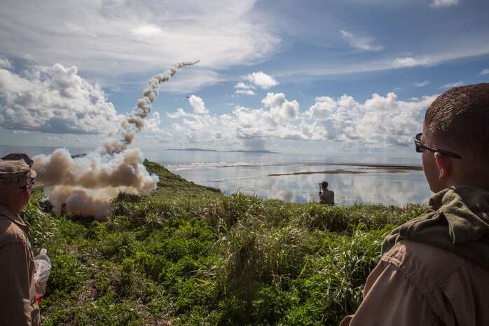 Marine Aerial Refueler Squadron 152 ordnance Marines watch a GTR-18 missile, better known as a "Smokey SAM," launch toward a KC-130J Super Hercules on an island outside of Okinawa, Japan, during a threat reaction evolution, Aug. 26, 2014. The threat reaction evolution is a chance for pilots to stay up to date on their qualifications while keeping an alert and aware mindset for any arising combat scenario.

