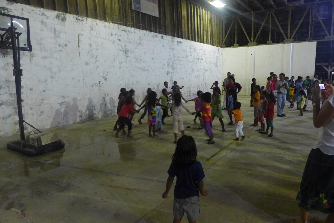 EBEYE,The Marshall Islands--  "Small Kine" performed on the third most densely populated island in the world, Ebeye, Aug. 16, 2014. Hundreds of people gathered in the Community Center to hear "Small Kine". It was a fun night, filled with dancing, singing, and games! 
(A.F. Photo by TSgt Michael Smith/released)