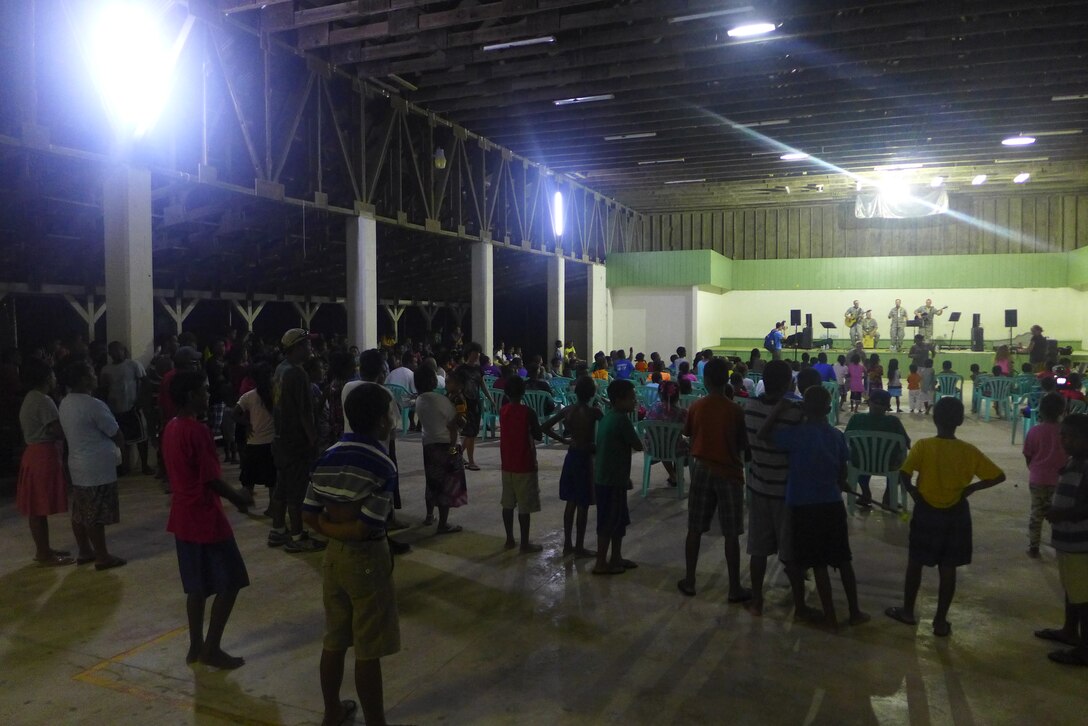 EBEYE,The Marshall Islands--  "Small Kine" performed on the third most densely populated island in the world, Ebeye, Aug. 16, 2014. Hundreds of people gathered in the Community Center to hear "Small Kine". It was a fun night, filled with dancing, singing, and games! 
(A.F. Photo by TSgt Michael Smith/released)