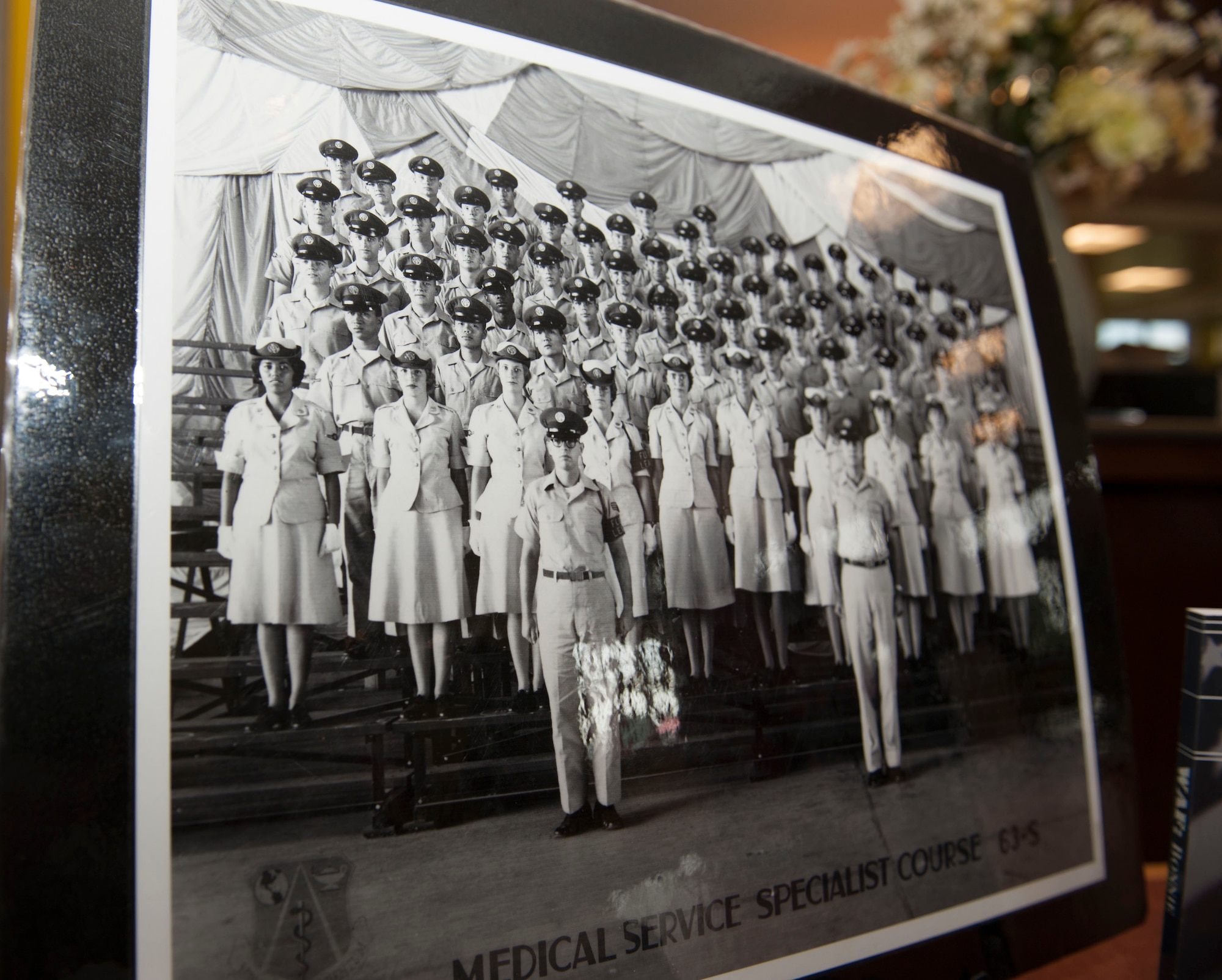 A picture the U.S. Air Force Medical Service Specialist Course graduate class of 1963 is displayed during a Women’s Equality Day presentation Aug. 26, 2014, on Buckley Air Force Base Colo. Women’s Equality Day commemorates the ratification of the 19th Amendment, granting women the right to vote. Today, it is celebrated in honor of modern day women’s rights to be seen as equals to men. (U.S. Air Force photo by Airman 1st Class Samantha Saulsbury/Released)