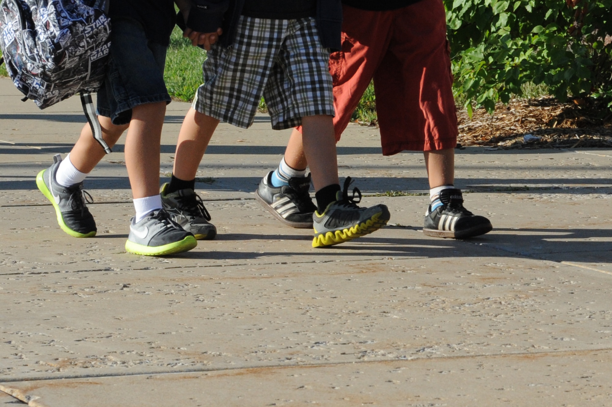 Students walk to school at Scott Elementary School on August 13, 2014 at Scott Air Force Base, Ill. Students get to school by walking, riding a bus, or being dropped off by car. (U.S. Air Force photo by Senior Airman Sarah Hall-Kirchner/Released)