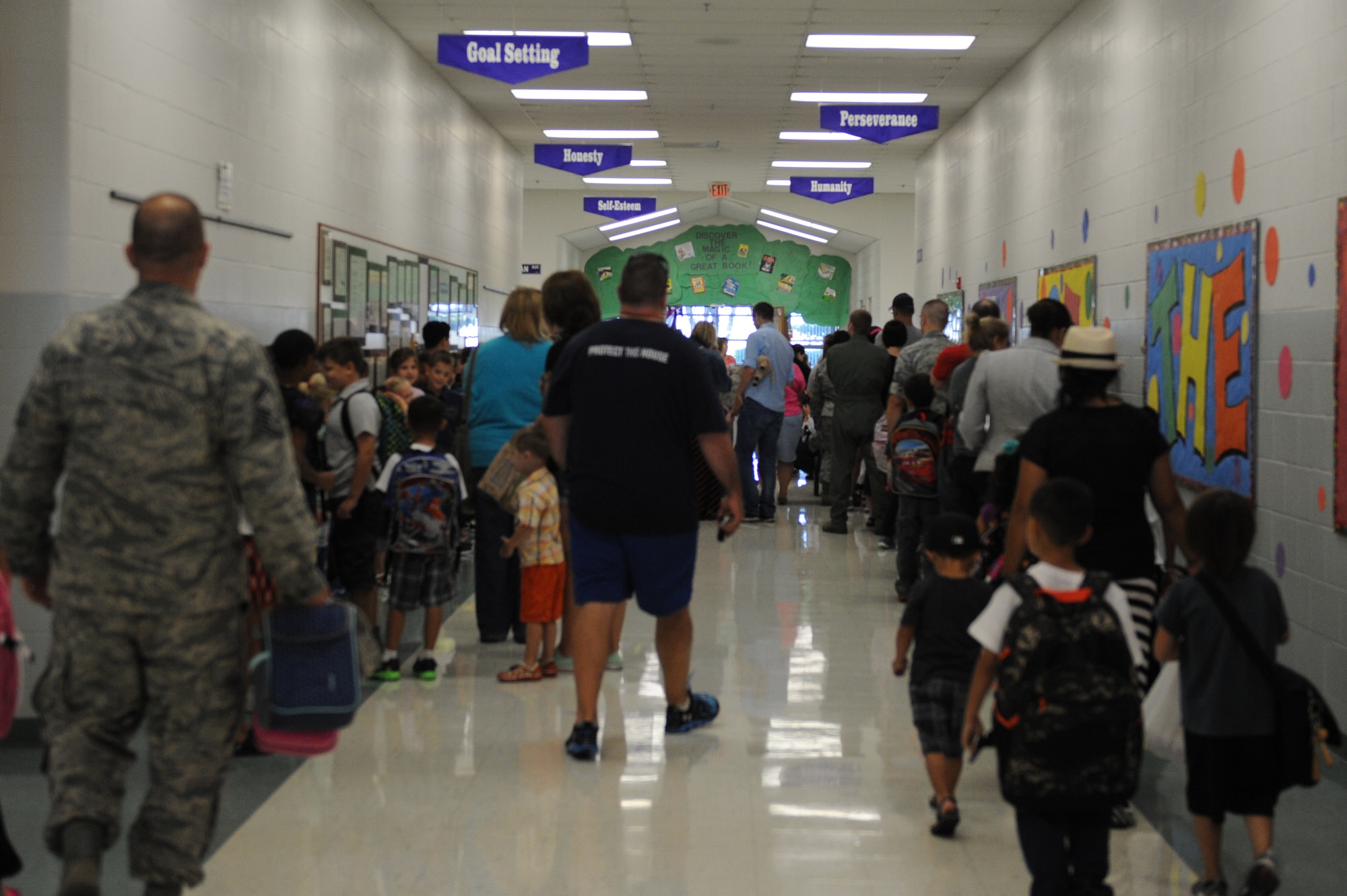 Students and parents queue in a hallway at Scott Elementary School at Scott Air Force Base, Ill. on August 13, 2014. The 2014-2015 school year began on August 13. (U.S. Air Force photo by Senior Airman Sarah Hall-Kirchner/Released)