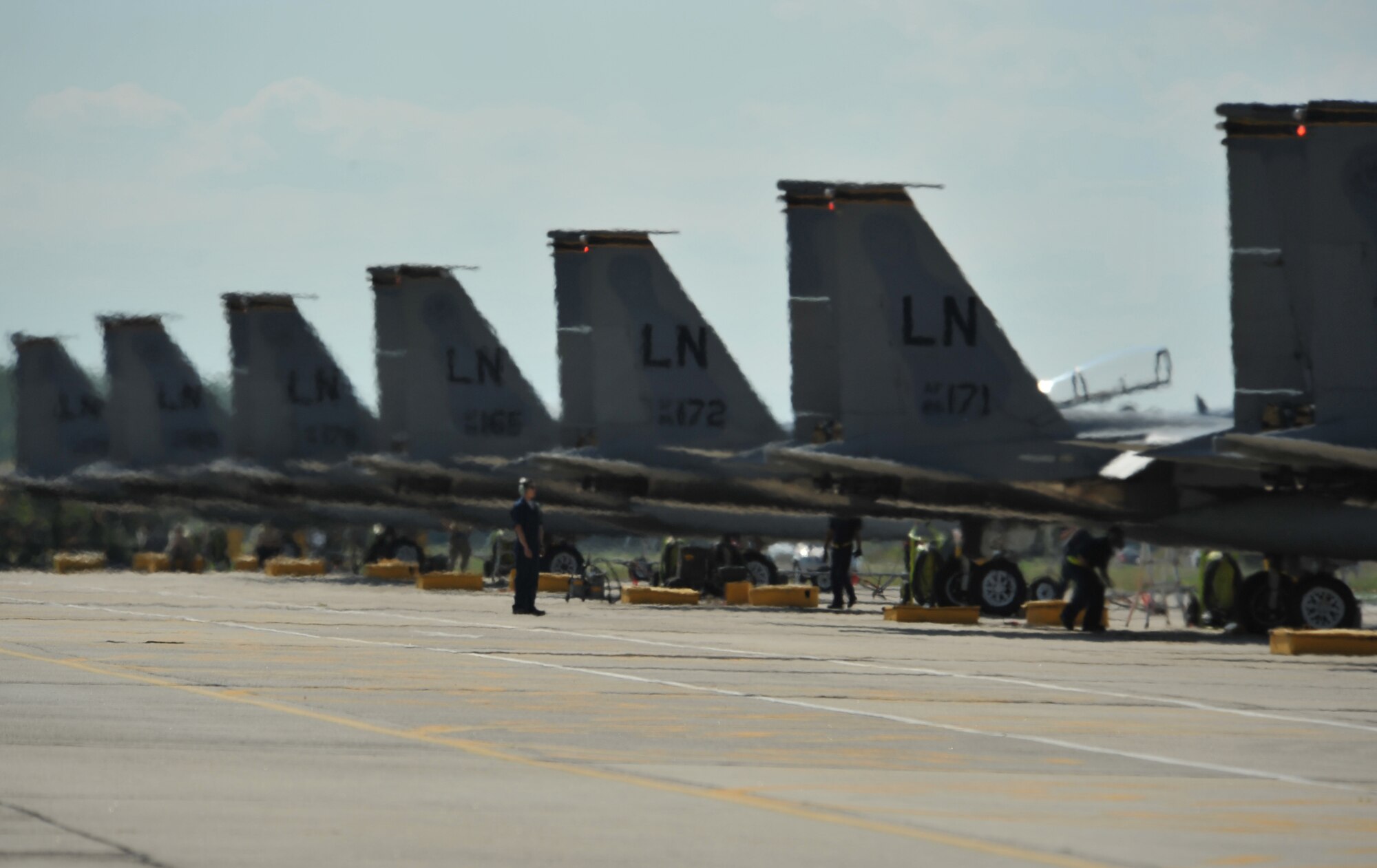 F-15C Eagles sit on the ramp at Graf Ignatievo Air Base near Plovdiv, Bulgaria, Aug. 18, 2014. More than 180 Airmen from U.S. Air Forces in Europe and Air Forces Africa flew to Bulgaria to participate in a bilateral training event, Thracian Eagle 2014, Aug. 18 through Sep. 1. (U.S. Air Force photo/Senior Airman Hailey Haux)