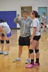 Amber Greeness, Stacey High School Eagles volleyball coach, gives instructions to Stacy HS senior, Alexandria Suglia during practice Aug. 15 at the Stacey High School gym. (Photo by Jose T. Garza III)