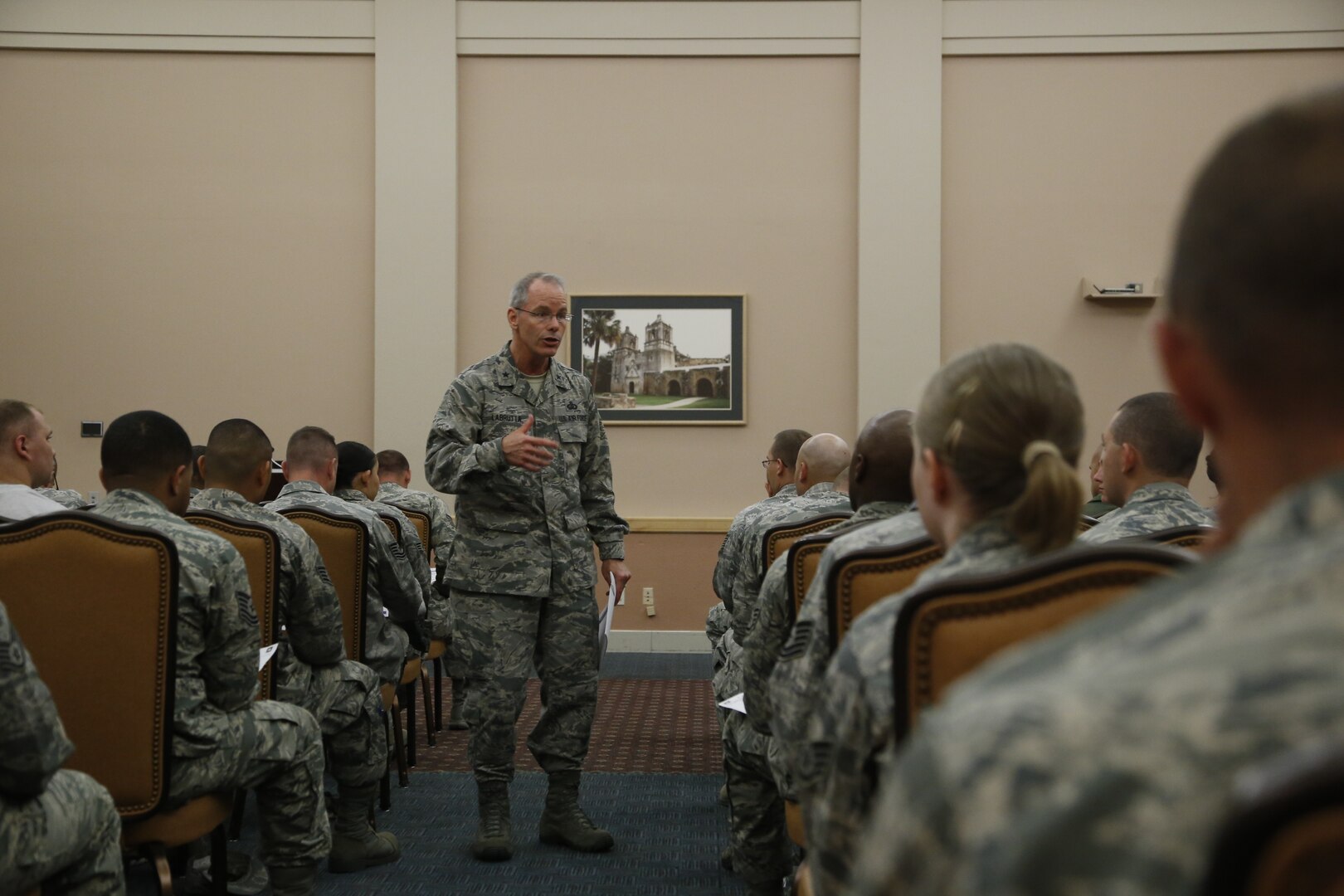 Brig. Gen. Bob LaBrutta, 502nd Air Base Wing and Joint Base San Antonio commander, speaks during the Aug. 20 JBSA-Lackland 5/6 meeting at the Gateway Club at JBSA-Lackland. LaBrutta covered a range of topics including his expectations of the NCO corps, the importance of Community College of the Air Force and professional military education, job performance, the new evaluation system, how to maintain a life/work balance and setting the standard vs. settling for the standard. (U.S. Air Force Photo by Senior Airman Krystal Jeffers)