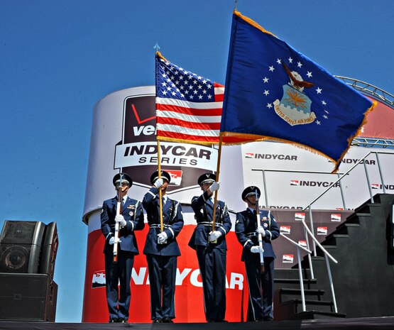 The Beale Air Force Base Honor Guard presents the colors during the opening ceremonies of the IndyCar GoPro Grand Prix Aug. 24, 2014, at Sonoma Raceway in Sonoma, Calif. Approximately 30 Beale Airmen and more than 100 military members performed during the opening ceremonies. (U.S. Air Force photo by Airman 1st Class Ramon A. Adelan/ Released)