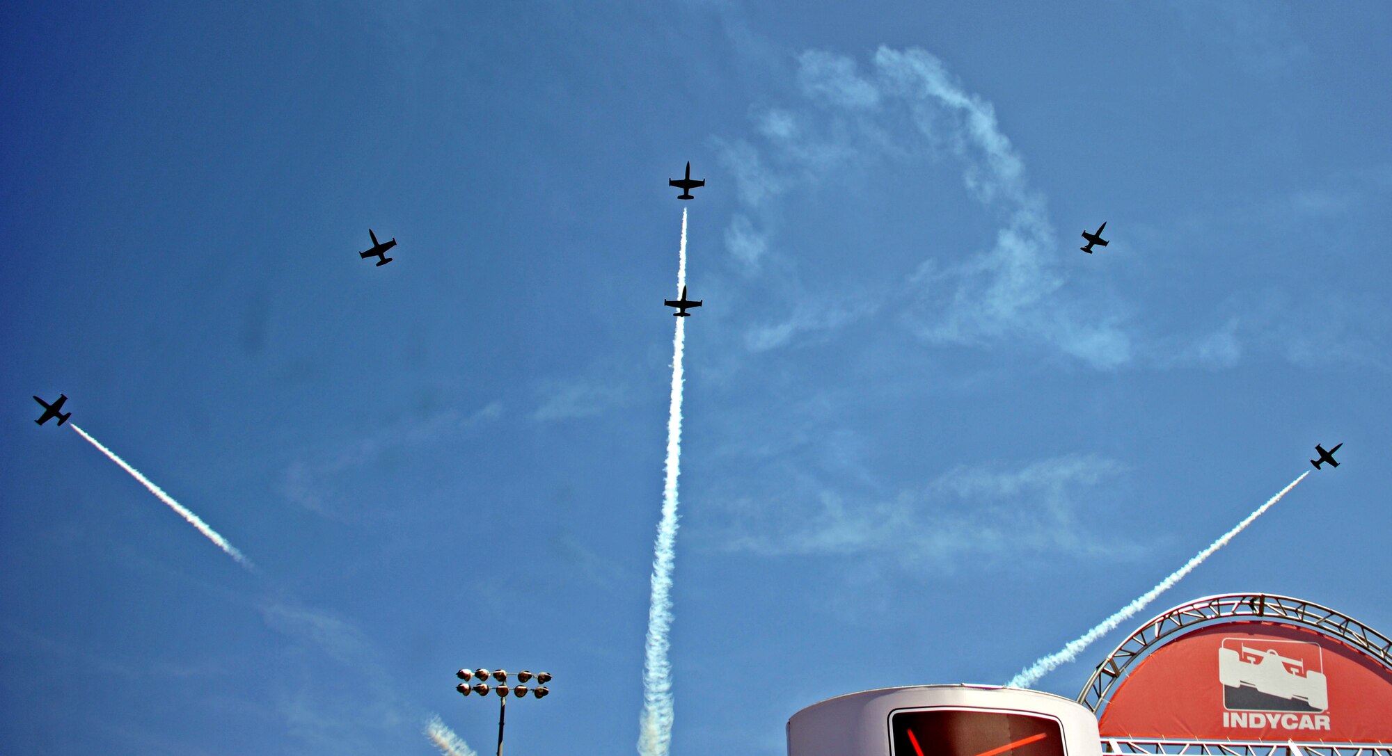 The Patriots Jet Team performs an aerial demonstration during the opening ceremonies at the IndyCar GoPro Grand Prix Aug. 24, 2014, at Sonoma Raceway in Sonoma, Calif. The team features pilots who were formerly part of the U.S. Air Force Thunderbirds, U.S. Navy Blue Angels, and Royal Canadian Air Force Snowbirds. (U.S. Air Force photo by Airman 1st Class Ramon A. Adelan/ Released)