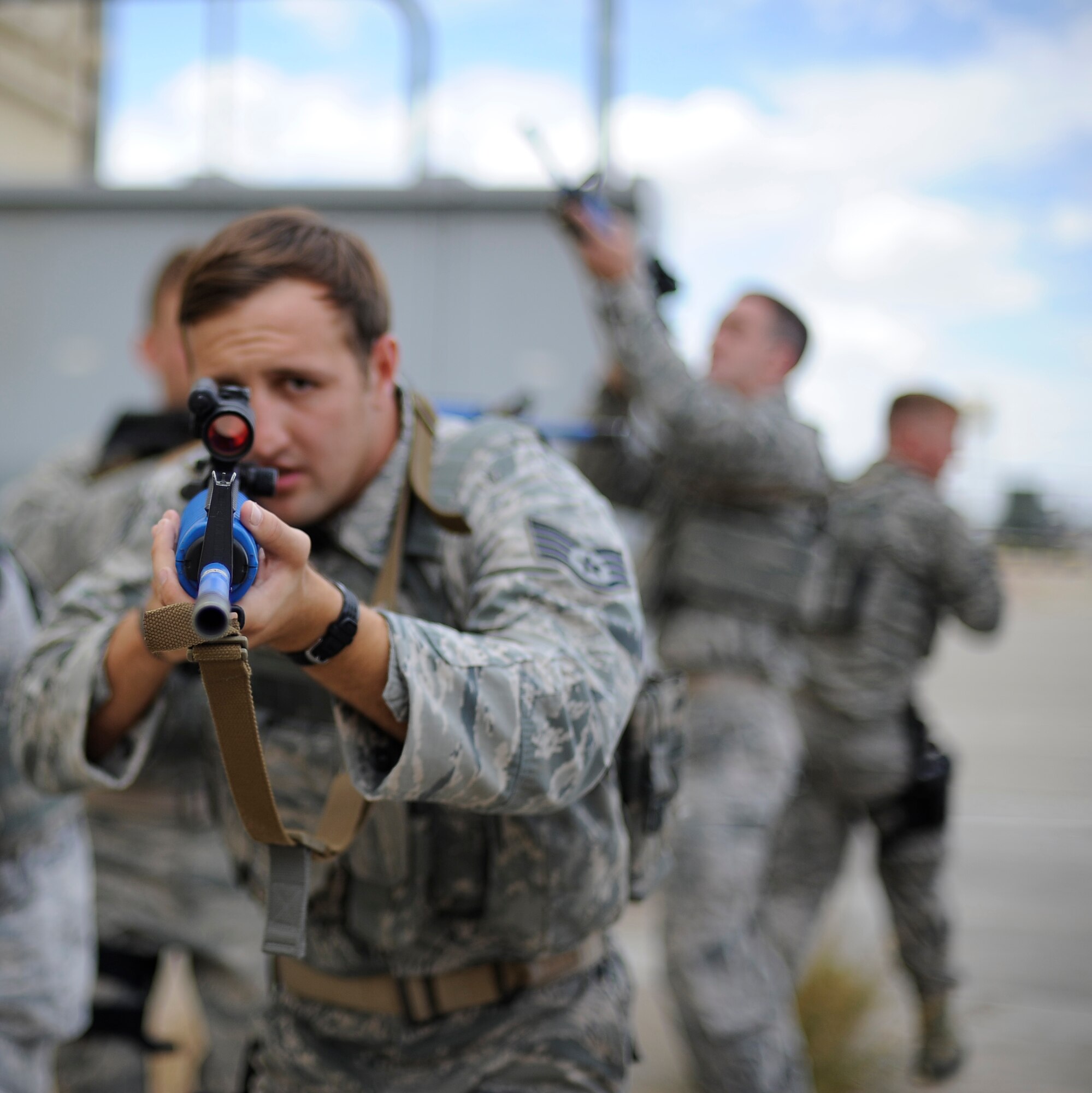 Staff Sgt. Bradley Akers, 341st Missile Security Forces Squadron security response team leader, simulates engaging possible threats during a training exercise at Malmstrom’s shoot house Aug. 14. Malmstrom’s security forces team members are training to compete in the Global Strike Challenge, which is the sole intercontinental ballistic missile, bomber and security forces competition in the world. (U.S. Air Force photo/Airman 1st Class Collin Schmidt)