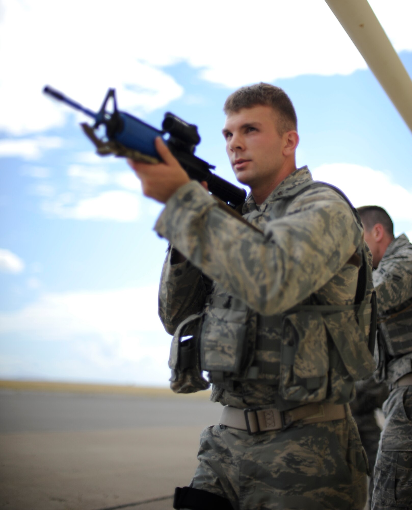 2nd Lt. Nicholas Lewis, 341st Missile Security Forces Squadron flight commander, simulates engaging possible threats during a training exercise at Malmstrom’s shoot house Aug. 14. The exercise is in preparation for the Global Strike Challenge where security forces members will be competing with teams from Minot Air Force Base, N.D. and F.E. Warren AFB, Wyo. (U.S. Air Force photo/Airman 1st Class Collin Schmidt)