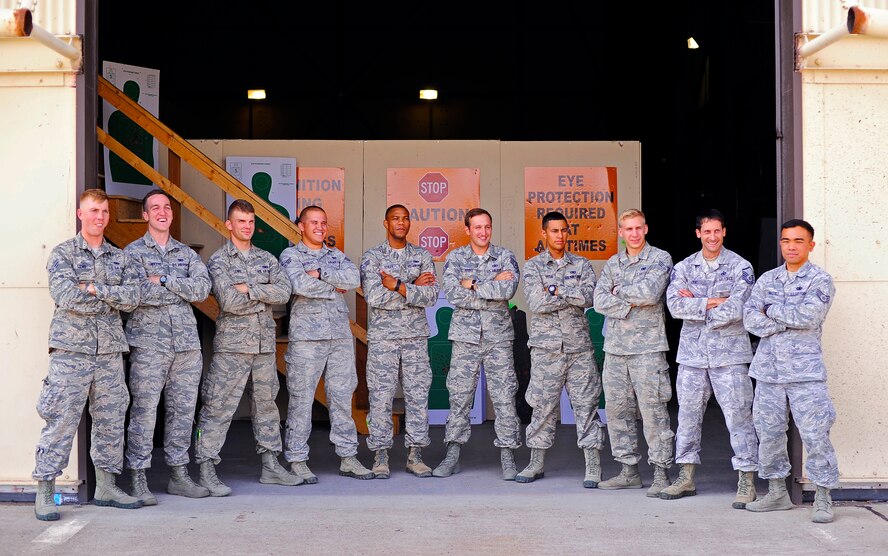 Team Malmstrom’s security forces team poses for a photograph after a training session at the shoot house trainer building Aug. 14. The team is one of nine from Malmstrom Air Force Base that will be competing in the 2014 Global Strike Challenge. (U.S. Air Force photo/Airman 1st Class Collin Schmidt)