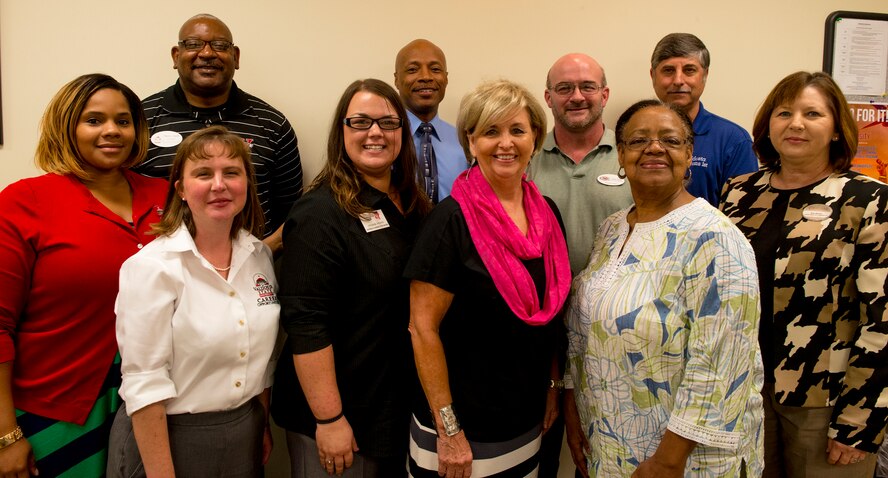 Moody’s transition team poses for a photo during a workshop at Moody Air Force Base, Ga., Aug. 26, 2014. Team members collaborated to establish a résumé and networking workshop designed to prepare separating Airmen for the workforce. (U.S. Air Force photo by Airman 1st Class Ceaira Tinsley/ Released)