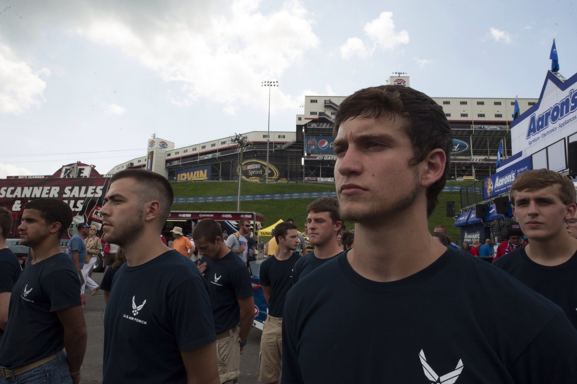Brandon Waddell stands by with East Tennessee’s Delayed Entry Program for a DEP swear-in ceremony at the Bristol Motor Speedway in Bristol, Tenn., August 23, 2014. Recruits in the DEP are all fully-qualified individuals for future enlistment into the Air Force. (U.S. Air Force photo by Airman Dillian Bamman/Released)
