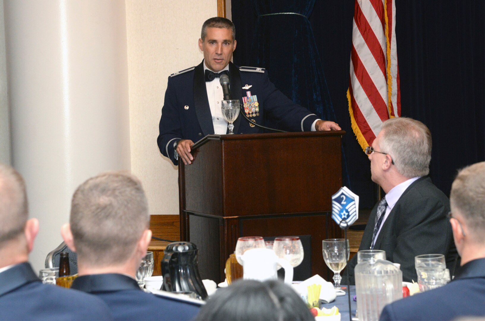 Col. Matthew Isler, 12th Flying Training Wing commander, addresses the attendees of the senior noncommissioned officer induction ceremony Aug. 22 at Joint Base San Antonio-Randolph. The SNCO induction ceremony is held to recognize individuals who progress through the ranks and have been selected for promotion to master sergeant, transitioning them to senior leadership level with more responsibility. (U.S. Air Force photo by Johnny Saldivar) 

