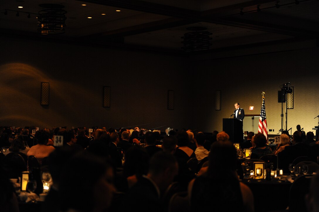 Retired U.S. Air Force Col. Kerry Taylor, former 97th Intelligence Squadron commander and current director of Ohio Aerospace Hub, speaks to nearly 400 past and present 97th IS members during the squadron’s heritage ball held in Omaha on Aug. 22. The 97th IS was marking 97 years of existence for its unit. (U.S. Air Force photo by U.S. Tech. Sgt. Jered Poloa)