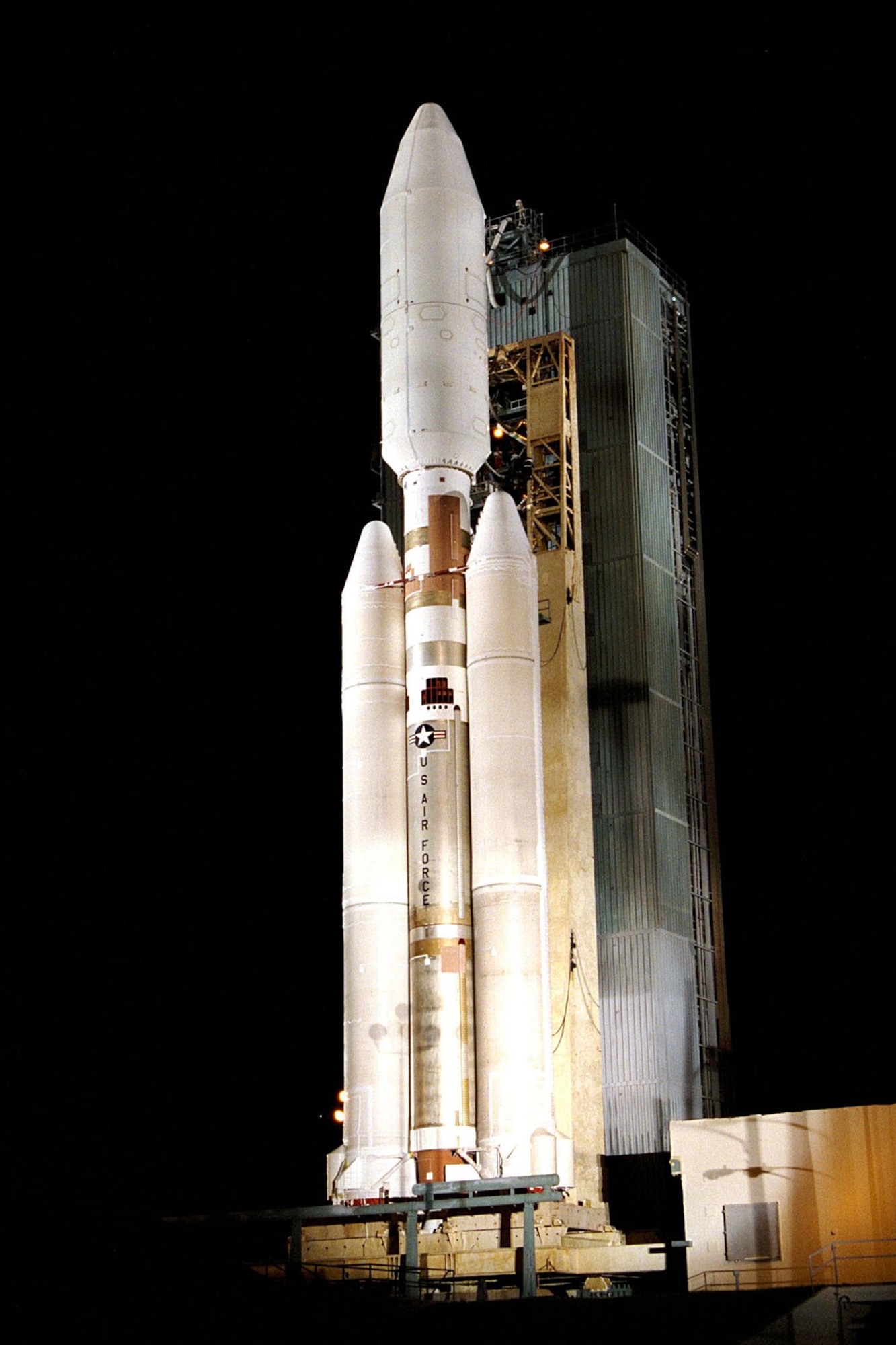 A Titan IVB at Cape Canaveral's Launch Complex 40 in 1997. This vehicle, similar to NMUSAF's but with a shorter payload fairing, carried the Cassini-Huygens probe into space to study Saturn. (U.S. Air Force photo)