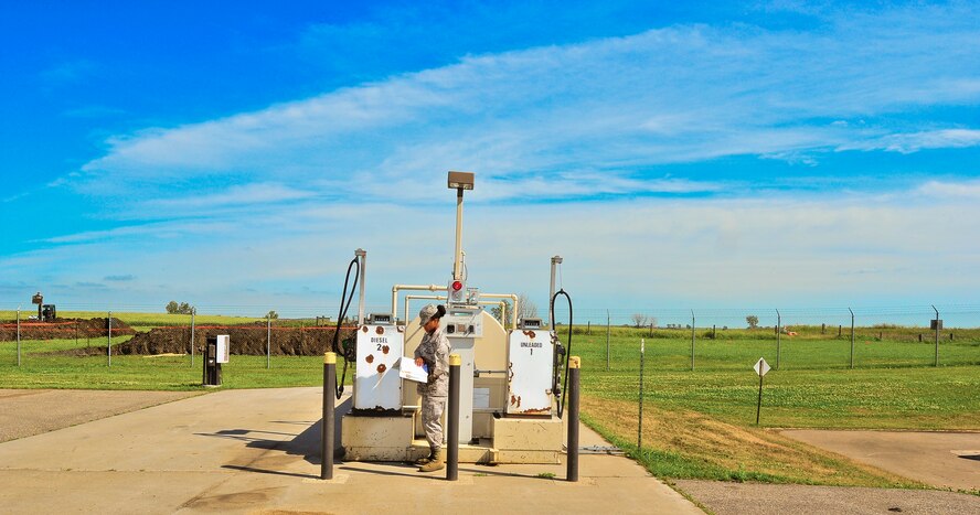 Staff Sgt. Chariesse Garrett, 741st Missile Squadron facility manager, checks the water levels during her shift at a missile alert facility in North Dakota. Each day FMs check water levels and the launch control equipment building to ensure everything is working properly. (U.S. Air Force photo/Senior Airman Brittany Y. Bateman)