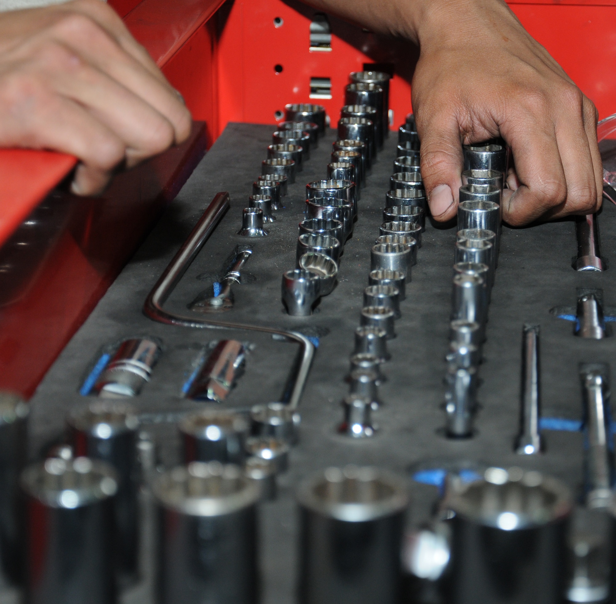 U.S. Air Force Airman 1st Class James Matthew Doligon, 100th Logistics Readiness Squadron Special Purpose Vehicle Maintenance apprentice from Kealakekua, Hawaii, selects the correct tool to secure fuel system components Aug. 8, 2014, on RAF Mildenhall, England. Doligon is part of the vehicle management flight that maintains 565 vehicles assigned to its fleet, 181 of which provide direct support to the generation and sustainment of aerial refueling, reconnaissance, air mobility and special operations. (U.S.
Air Force photo/Gina Randall/Released)
