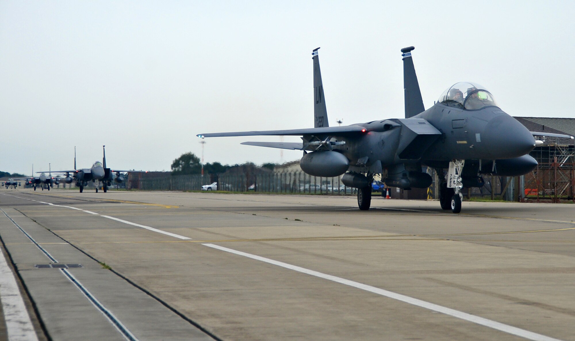 Fighter pilots assigned to the 494th Fighter Squadron arrive at Royal Air Force Lakenheath, England, Aug. 25, 2014, from exercises in the U.S. Red Flag is an advanced training program and provides participants with valuable training in planning and executing a wide-variety of combat missions. (U.S. Air Force photo by Airman 1st Class Erin O’Shea/Released) 