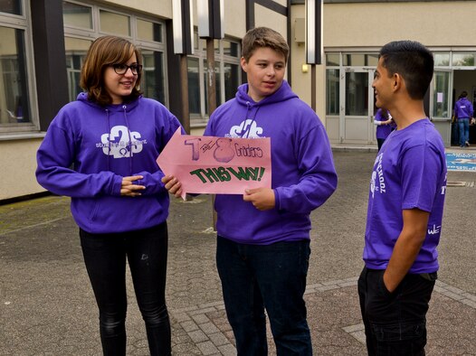 Therese Gatterburg, left, 10th grade student at Bitburg Middle-High School and native of Heidelberg, Germany, interacts with her colleagues at the Student 2 Student orientation event in Bitburg Middle-High School at Bitburg, Germany, Aug. 22, 2014. The Student 2 Student members lead the orientation event to help welcome the new students entering their school. (U.S. Air Force photo by Airman 1st Class Timothy Kim/Released)