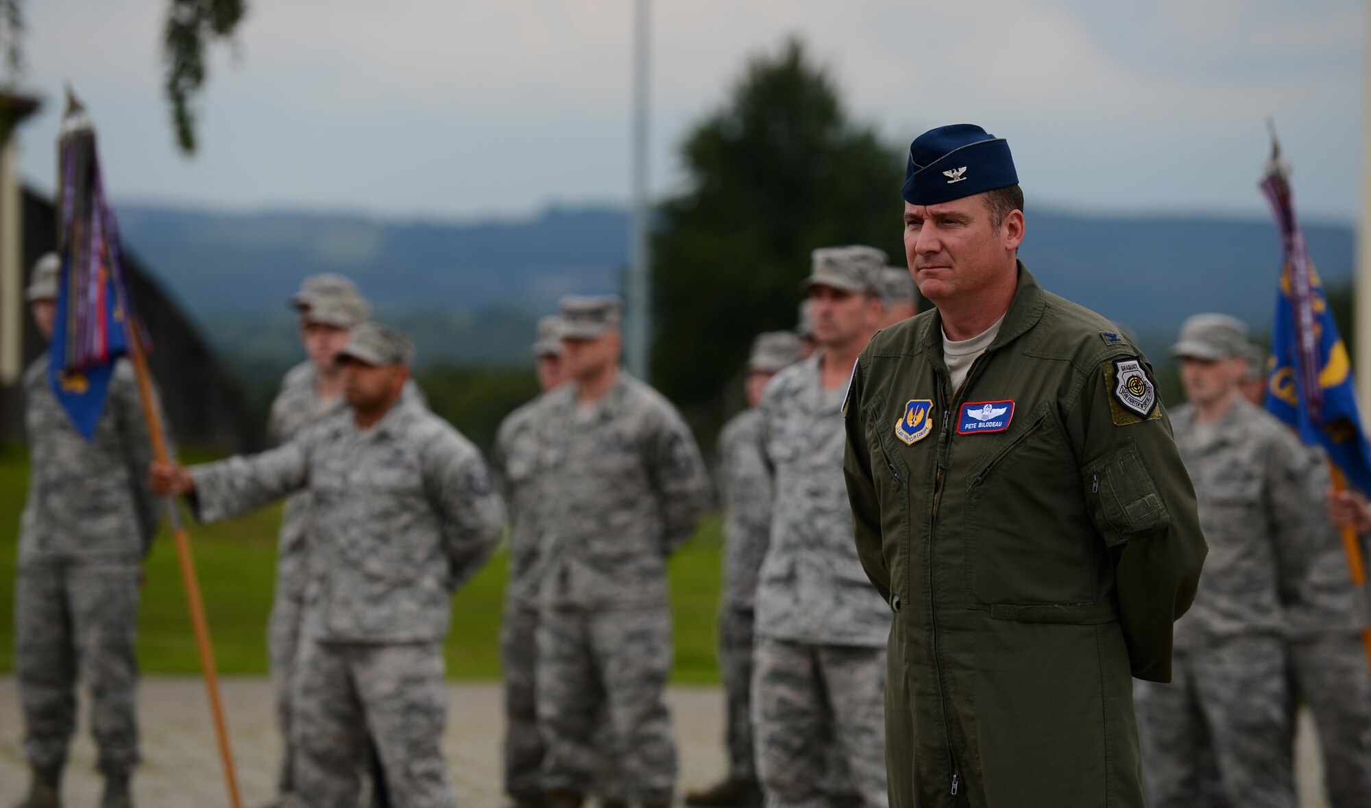 U.S. Air Force Col. Pete Bilodeau, 52nd Fighter Wing commander, stands at parade rest during a retreat ceremony at Spangdahlem Air Base, Germany, Aug. 25, 2014.  This ceremony marked Bilodeau’s first time leading the retreat ceremony since taking command of the 52nd FW. (U.S. Air Force photo by Airman 1st Class Luke J. Kitterman/Released)