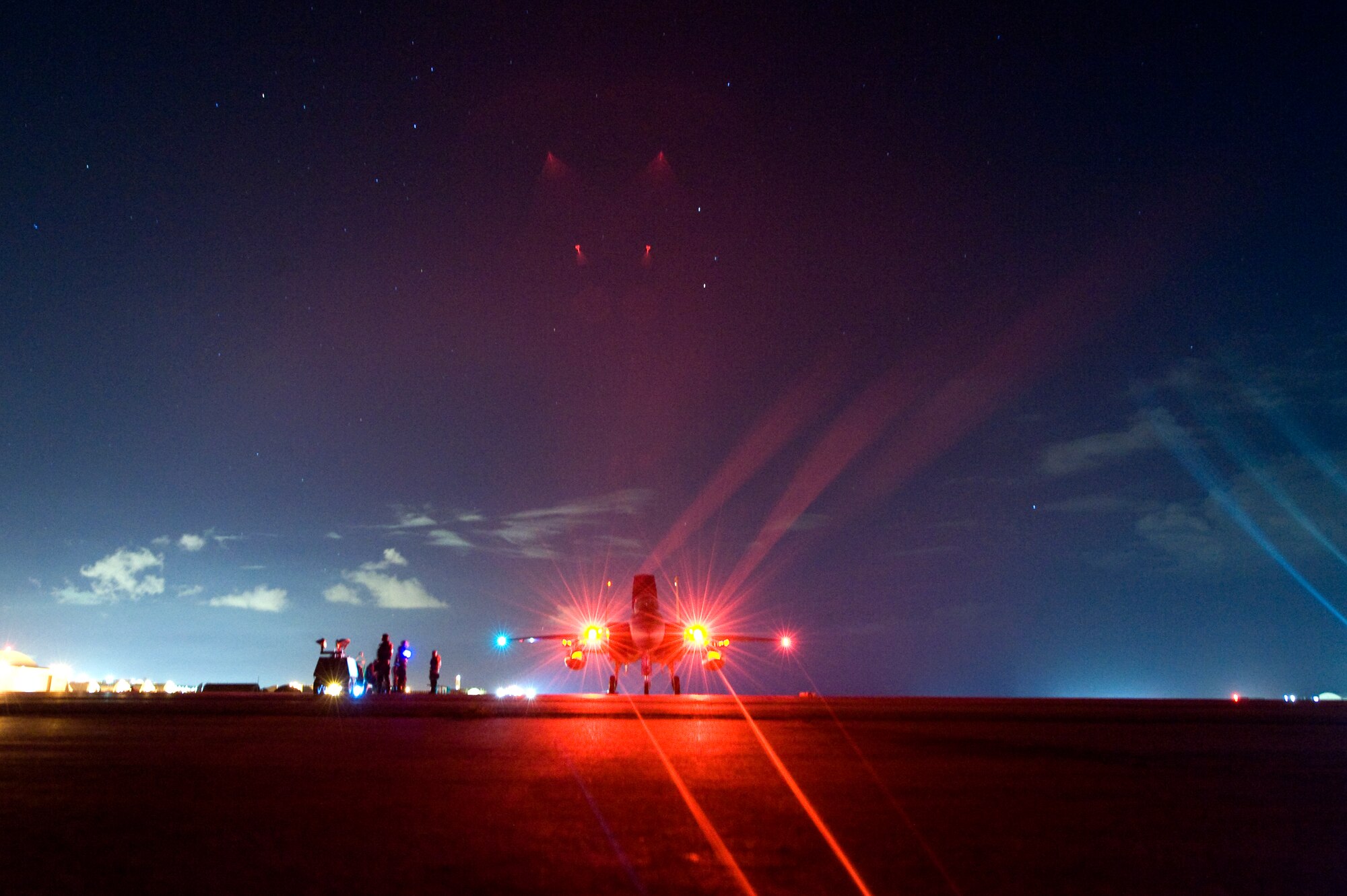 A U.S. Air Force F-15C Eagle awaits emergency response during a hung munitions exercise as part of a mission focused exercise on Kadena Air Base, Japan, Aug. 21, 2014. Eagles are highly maneuverable, twin-engine fighter jets designed to aid the Air Force in achieving air dominance against an enemy. During MFEs, Airmen train to respond to a multitude of scenarios in order to increase combat readiness and the ability to operate effectively in a hostile environment. (U.S. Air Force photo by Senior Airman Maeson L. Elleman)