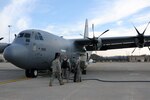 Airmen with the 193rd Special Operations Wing of the Pennsylvania Air National Guard load a C-130J as they prepare to depart Middletown, Pa., Jan. 15, 2010. These, and other Airmen from the 193rd will participate in the humanitarian assistance and disaster relief mission in Haiti.