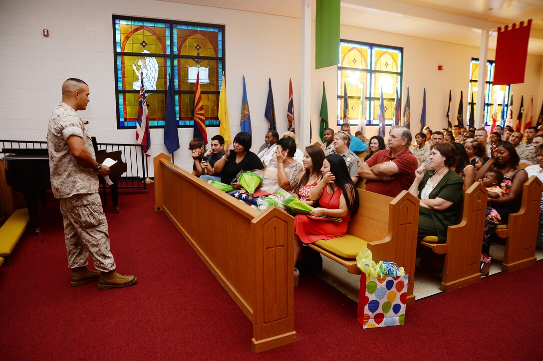 Master Sgt. Mark Carabello, operations and training chief, Operations and Training Division, Marine Corps Logistics Base Albany, speaks to spectators following his retirement ceremony at the Chapel of the Good Shepherd, here, Aug. 25. Carabello’s emotional farewell speech marked the end of a 23 year active-duty career. He also received a Meritorious Service Medal.
