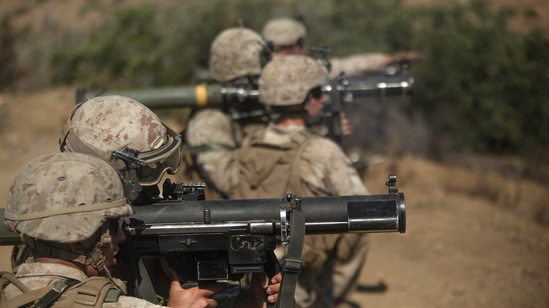 Lance Cpl. Scott Wern, an assaultman with Company E, 2nd Battalion, 5th Marine Regiment, and fellow Marines prepare to fire a volley of rockets aboard Marine Corps Base Camp Pendleton, Calif., Aug. 22, 2014. The Marines performed the rocket drills to  sustain of the Marine’s operational abilities.