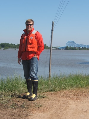 Ryne Salyer, Louisville District safety and occupational health specialist, is pictured during 2011 flood emergency response.