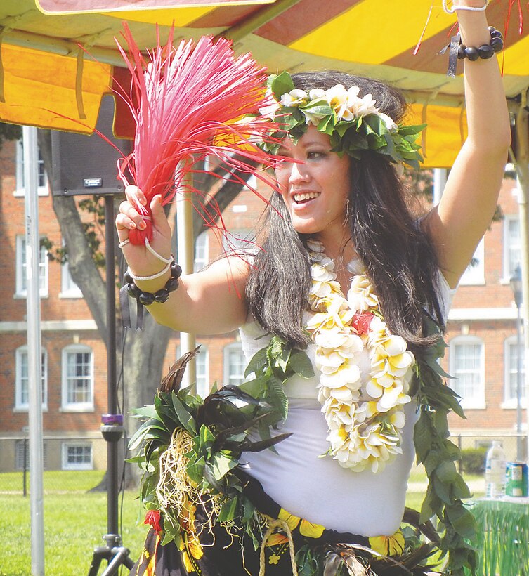 Kinikia Lin-Kissick performs a Hawaiian dance during the Civilian Appreciation Day picnic at Barnett Field on Aug. 21.