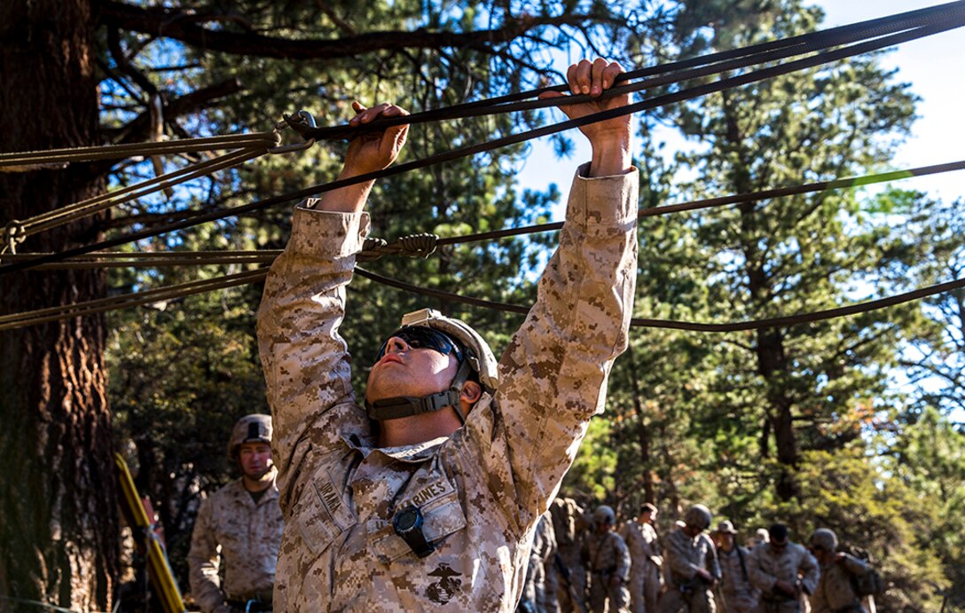 U.S. Marine Sgt. Jose Uranga tests the tension of the ropes while training to build and cross rope bridges during Mountain Exercise 2014 aboard Marine Corps Mountain Warfare Training Center in Bridgeport, Calif., Aug. 27, 2014. Uranga is a platoon sergeant with 2nd Platoon, India Company, 3rd Battalion, 1st Marine Regiment. Marines with 3rd Battalion, 1st Marine Regiment will become the 15th Marine Expeditionary Unit’s ground combat element in October. Mountain Exercise 2014 develops critical skills the battalion will need during deployment.