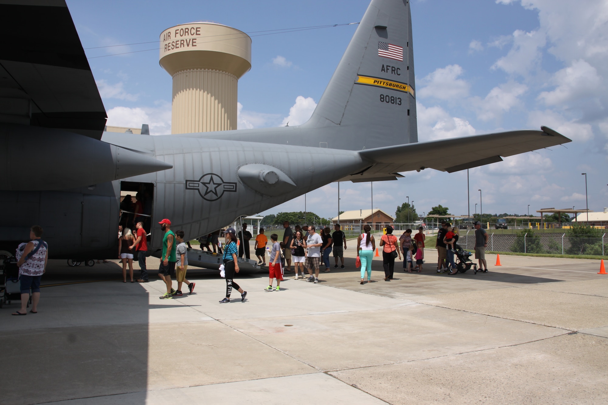 911th Airlift Wing family members gather around a C-130 Hercules static display at the Pittsburgh International Airport Air Reserve Station, August 2, 2014. (U.S. Air Force photo by Staff Sgt. Jonathan Hehnly)