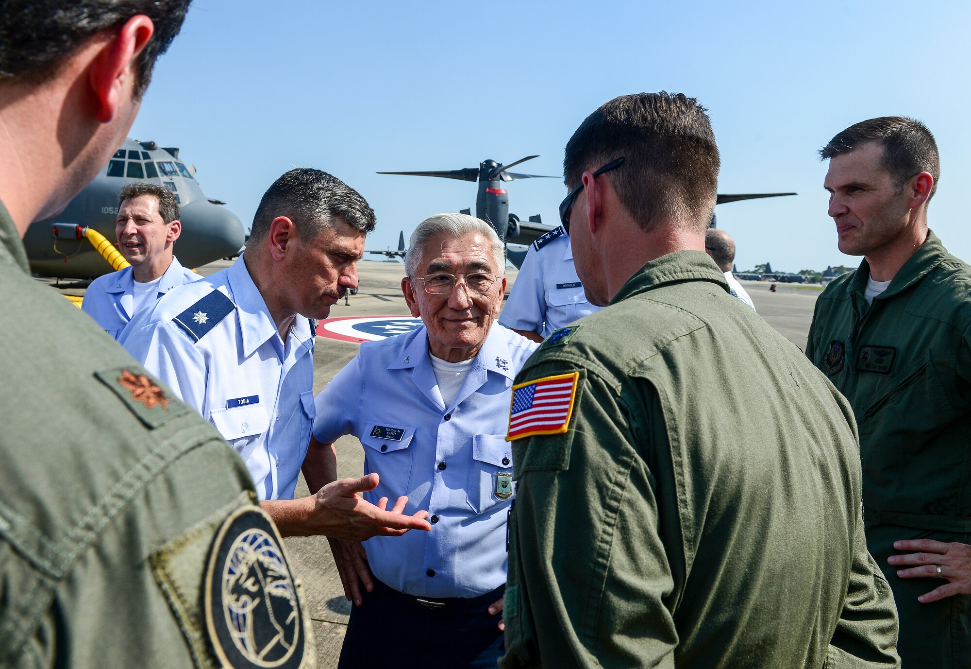 Gen. Juniti Saito, Brazilian Air Force commander, is briefed by 34th Special Operations Squadron personnel on the flightline at Hurlburt Field, Fla., Aug. 22, 2014. Saito toured different units on Hurlburt Field as part of the Air Force Chief of Staff Counterpart Program, which helps build, sustain and expand relationships with other nations. (U.S. Air Force photo/Airman 1st Class Jeff Parkinson)