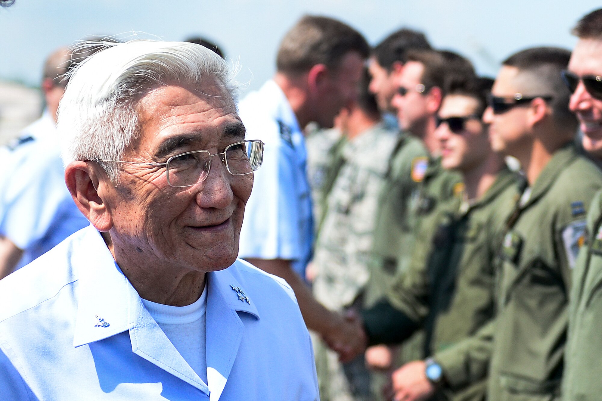 Gen. Juniti Saito, Brazilian Air Force commander, greets 1st Special Operations Wing personnel on the flightline at Hurlburt Field, Fla., Aug. 22, 2014. Saito toured different U.S. Air Force bases as part of the Air Force Chief of Staff Counterpart Program, which helps build, sustain and expand relationships with other nations. (U.S. Air Force photo/Airman 1st Class Jeff Parkinson)