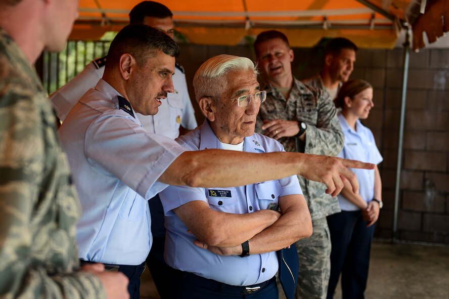 Lt. Col. Charles Tobia, Eglin Air Force Base developmental engineer, translates for Gen. Juniti Saito, Brazilian Air Force commander at Hurlburt Field, Fla., Aug. 22, 2014. Saito is a participant of the Air Force Chief of Staff Counterpart Program, which helps build, sustain and expand relationships with other nations. (U.S. Air Force photo/Airman 1st Class Jeff Parkinson)