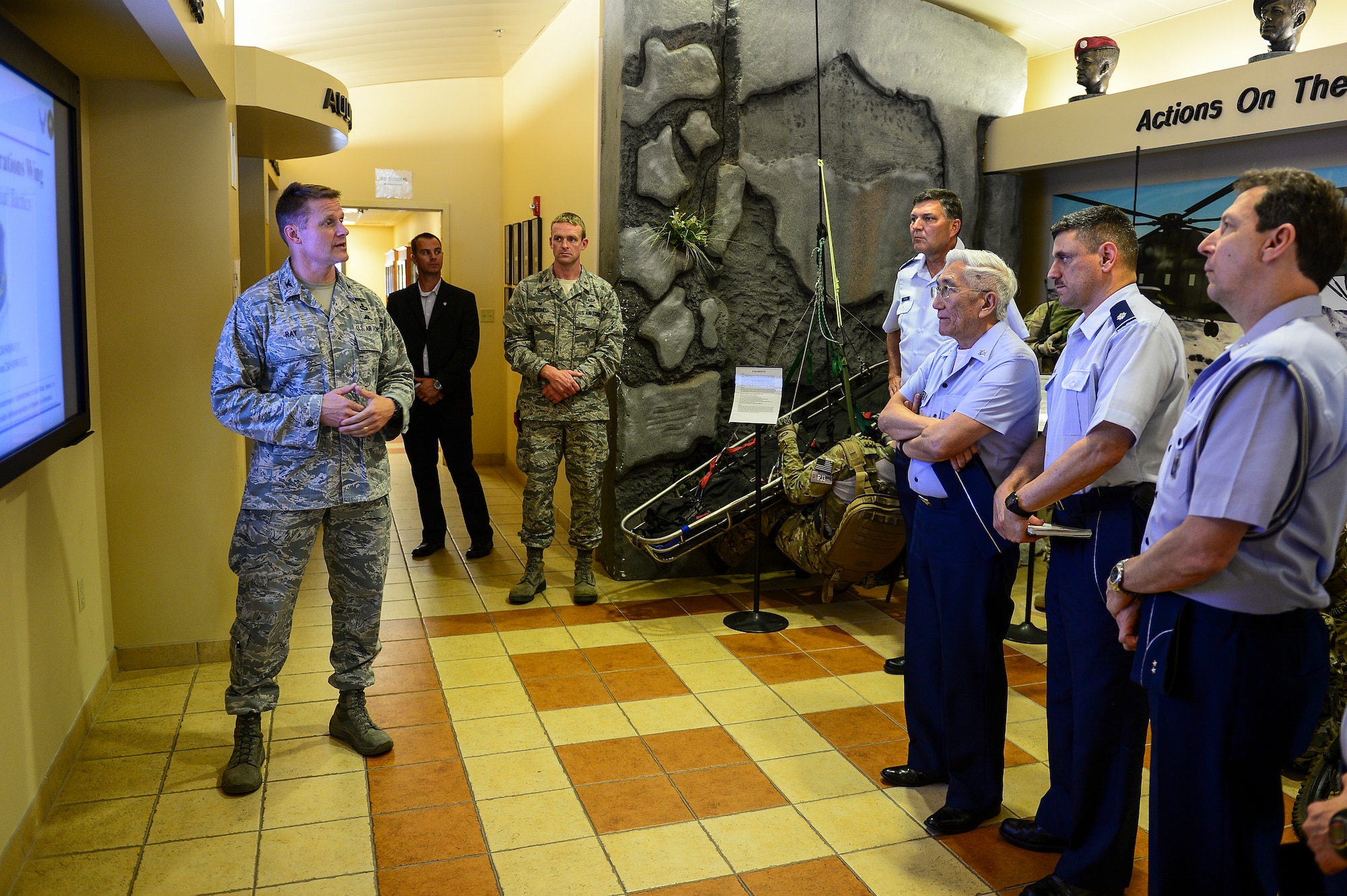 Col. Eric Ray, 24th Special Operations Wing commander, briefs Gen. Juniti Saito, Brazilian Air Force commander, on special tactics at the Special Tactics Training Squadron, Hurlburt Field, Fla., Aug. 22, 2014. Saito is a participant of the Air Force Chief of Staff Counterpart Program, which helps build, sustain and expand relationships with other nations. (U.S. Air Force photo/Airman 1st Class Jeff Parkinson)