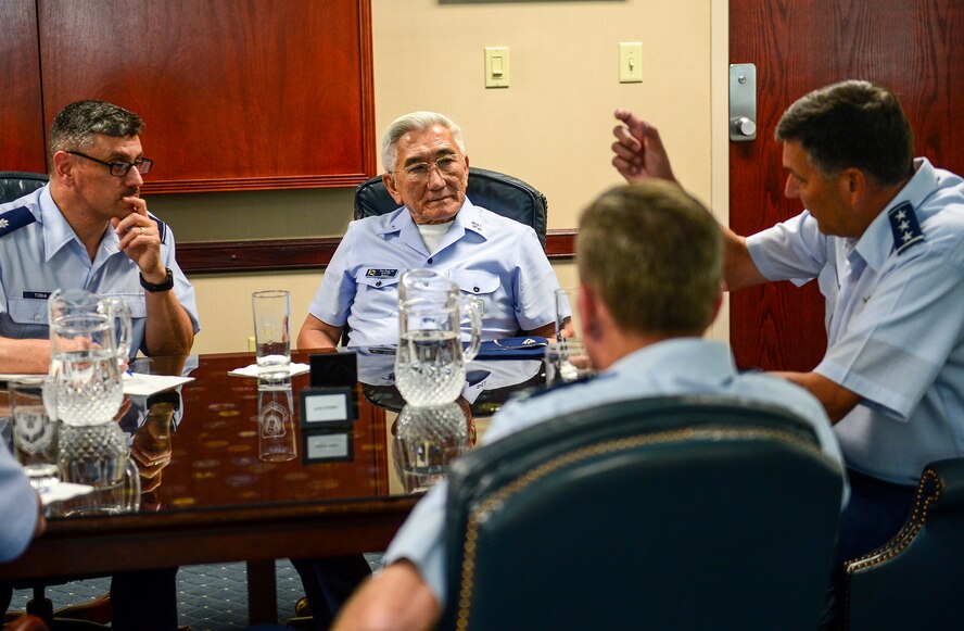 Lt. Gen. Brad Heithold, Air Force Special Operations Command commander, briefs Gen. Juniti Saito, Brazilian Air Force commander, during an office call at AFSOC Headquarters, Hurlburt Field, Fla., Aug. 22, 2014. Saito is a participant of the Air Force Chief of Staff Counterpart Program, which helps build, sustain and expand relationships with other nations. (U.S. Air Force photo/Airman 1st Class Jeff Parkinson)