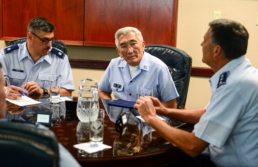 Lt. Gen. Brad Heithold, Air Force Special Operations Command commander, briefs Gen. Juniti Saito, Brazilian Air Force commander, during an office call at AFSOC Headquarters, Hurlburt Field, Fla., Aug. 22, 2014. Saito toured different U.S. Air Force bases as part of the Air Force Chief of Staff Counterpart Program. (U.S. Air Force photo/Airman 1st Class Jeff Parkinson)