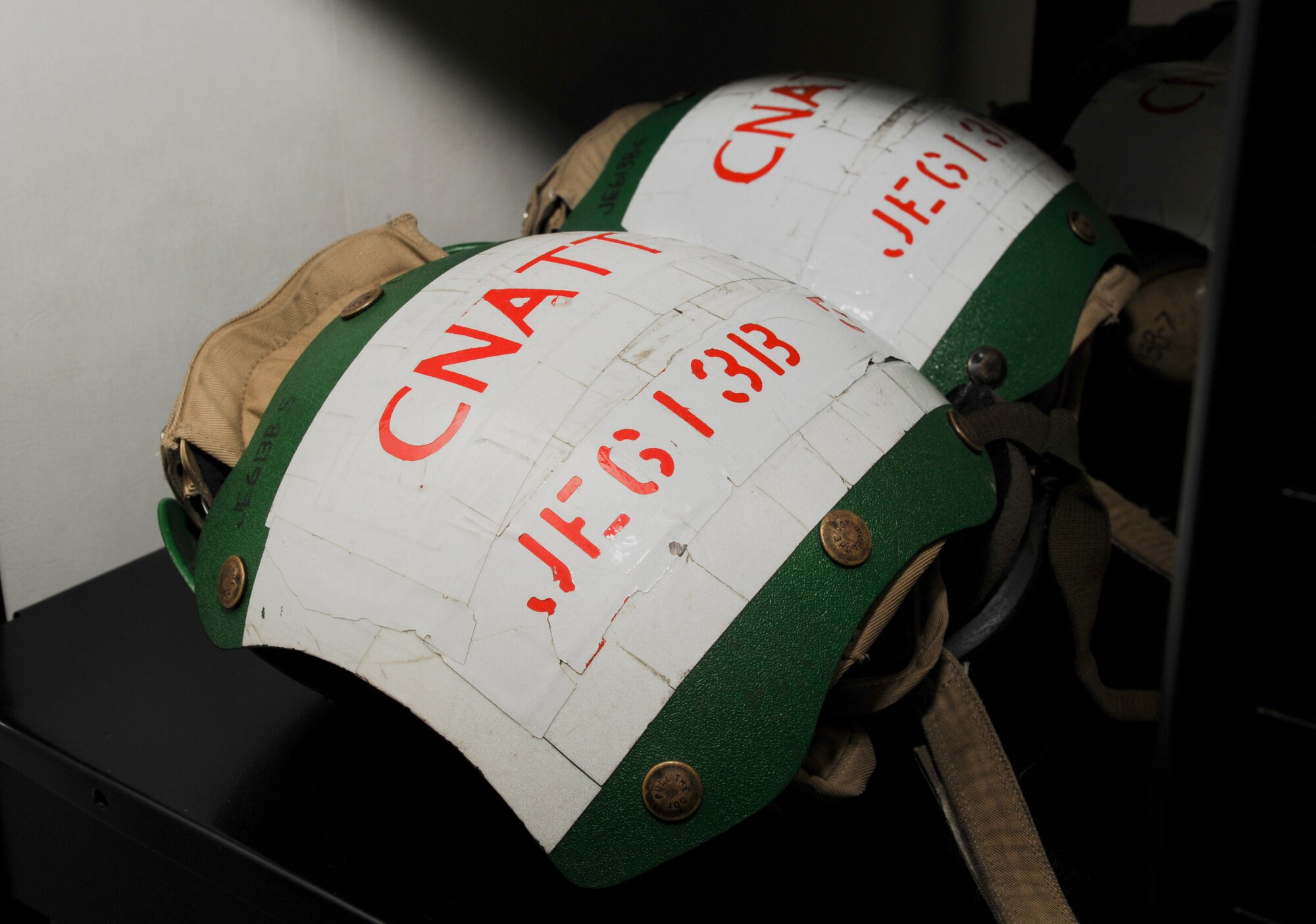 Cranial helmets sit in the back of a classroom in the Center for Naval Aviation Technical Training July 19, 2014, at Little Rock Air Force Base, Ark. Cranials are used for training in C-130s. (U.S. Air Force photo by Airman 1st Class Mercedes Muro) 