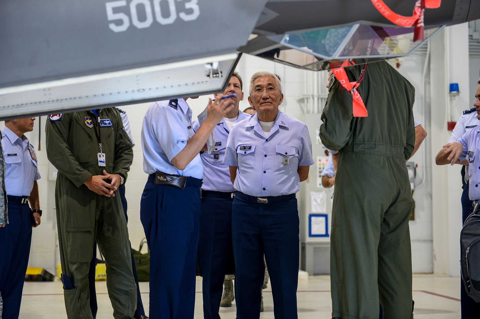 Gen. Juniti Saito, Brazilian Air Force commander, views an F-35 Lighting II aircraft at Eglin Air Force Base, Fla., Aug. 22, 2014. Saito toured different overseas and stateside bases as part of the Air Force Chief of Staff Counterpart Program. (U.S. Air Force photo/ Airman 1st Class Jeff Parkinson)