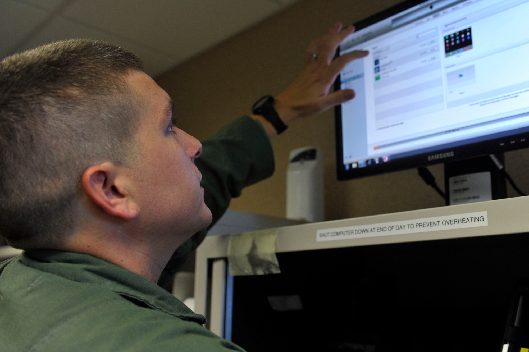 Senior Airman Michael Feliz, a 19th Operations Group publications officer and C-130J loadmaster, does inventory and software updates on tablets and other electronic devices Aug. 25, 2014, at Little Rock Air Force Base, Ark. Feliz is a steward for the Little Rock AFB $550k iPad program and creates policy and procedures for the implementation of Air Mobility Command’s Electronic Flight Bag program. Additionally, he maintains qualification as a C-130J mission loadmaster and is expected to attend instructor school in the near future. (U.S. Air Force photo by Senior Airman Regina Agoha)  