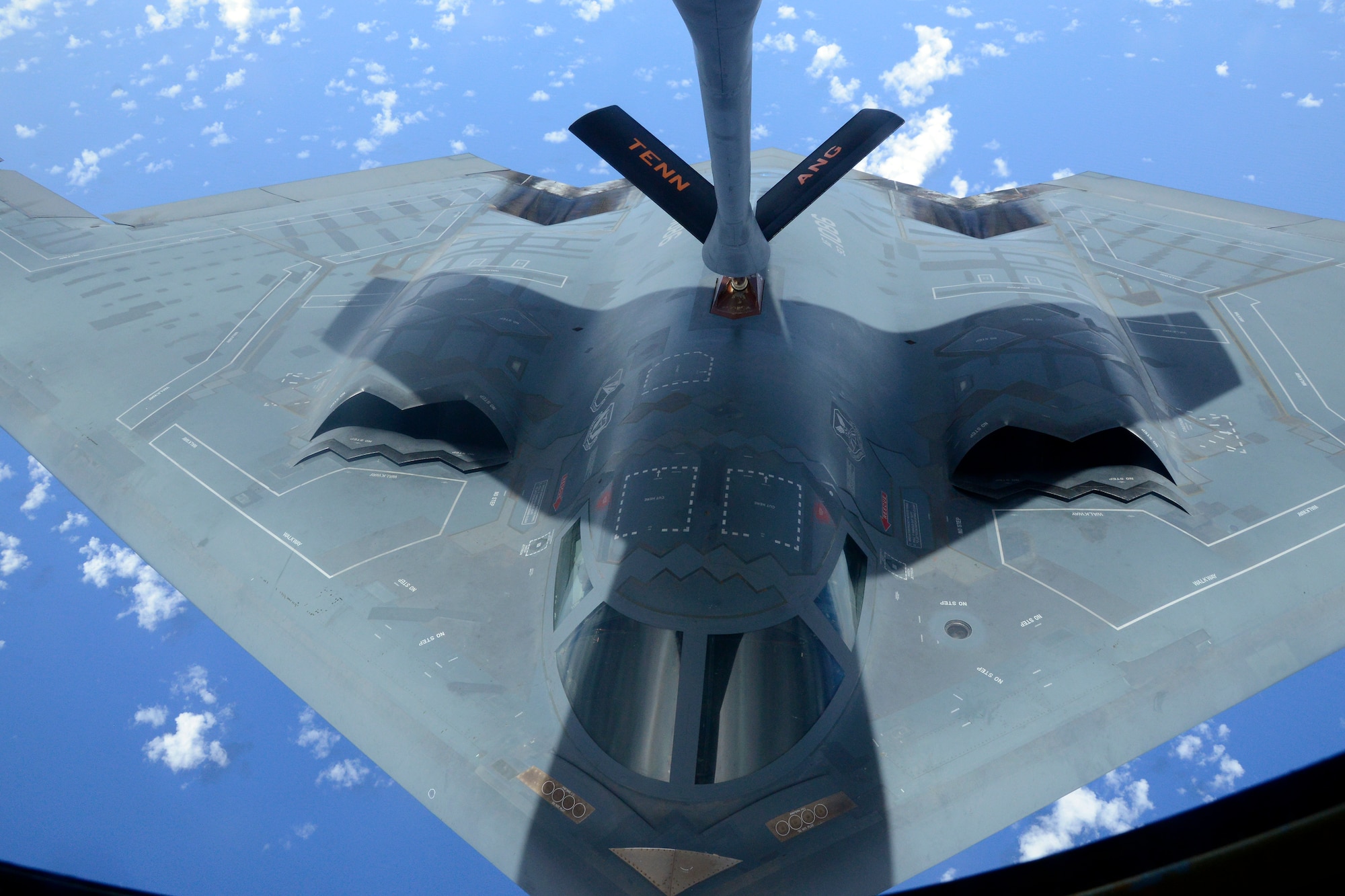 A B2 Stealth Bomber is refueled by a KC135-R Stratotanker from the 134th Air Refueling Wing, Tennessee Air National Guard over the Pacific during a training mission.  (U.S. Air National Guard photo by Staff Sgt. Ben Mellon, 134 ARW Public Affairs)