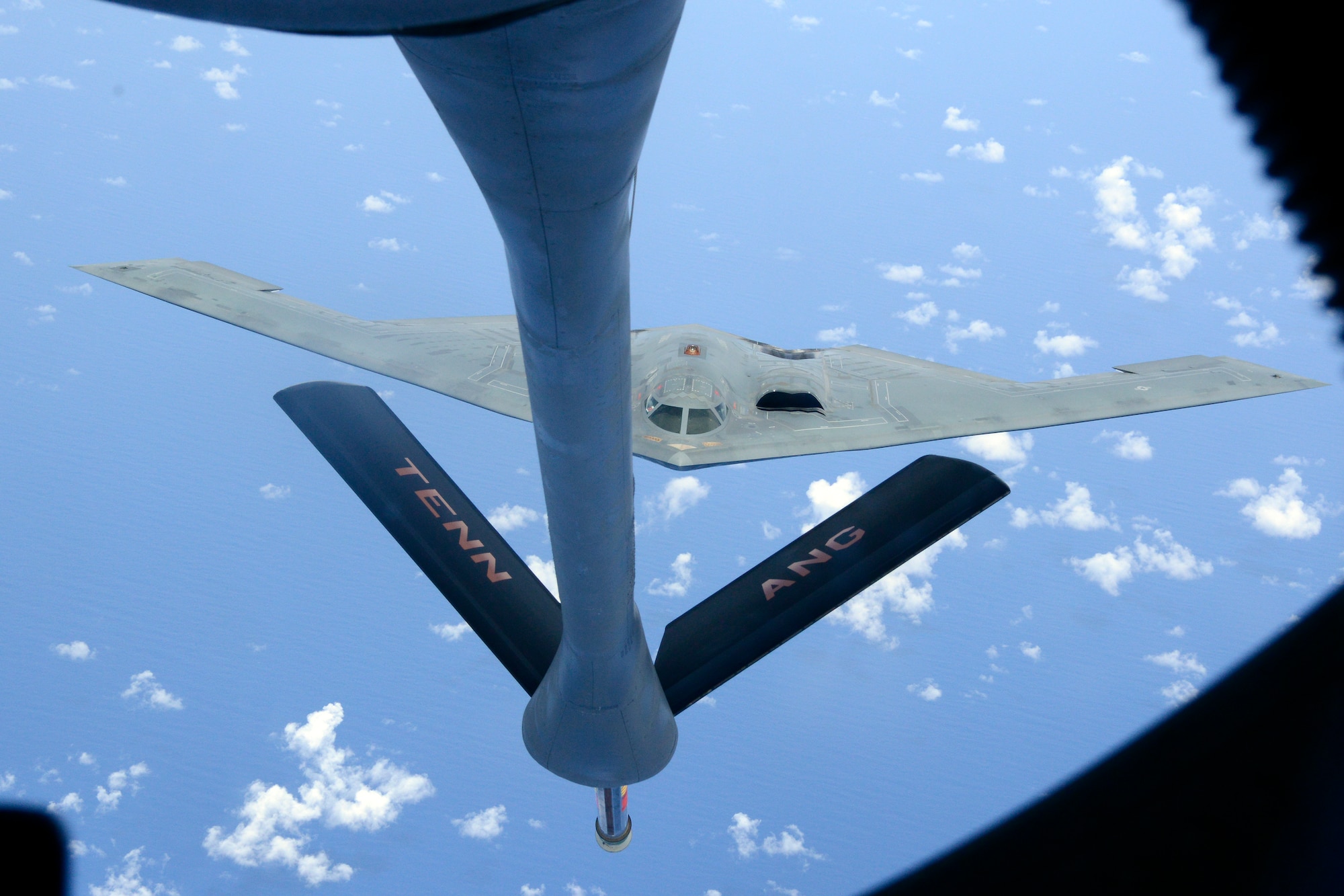A B2 Stealth Bomber is refueled by a KC135-R Stratotanker from the 134th Air Refueling Wing, Tennessee Air National Guard over the Pacific during a training mission.  (U.S. Air National Guard photo by Staff Sgt. Ben Mellon, 134 ARW Public Affairs)