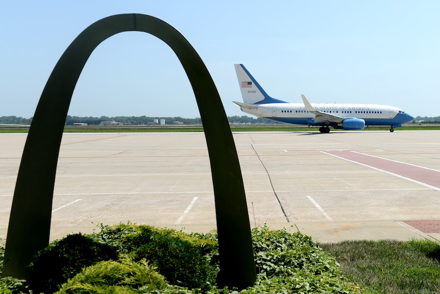 Col. Albert Lupenski passes by the base operations arch at the end of his "fini" flight on August 25, which will be his last time in the C-40C before moving on to his next position as wing commander at Westover Air Force Base.  (U.S. Air Force photo/ Airman 1st Class Kiana Brothers )