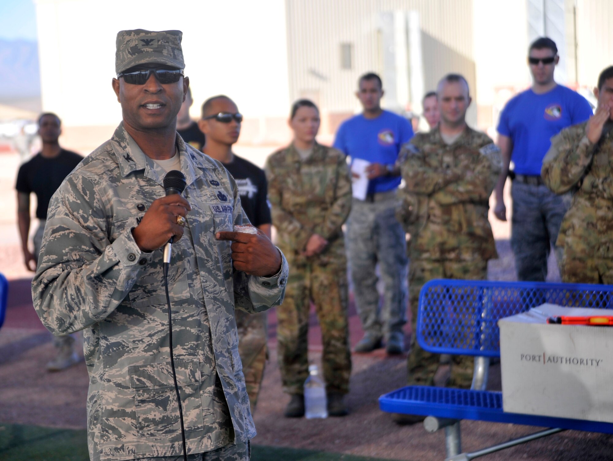 Col. Richard Neal, 799th Air Base Group commander, addresses the participants of the Warrior Challenge Aug. 24, 2014, at Creech Air Force Base, Nev. The Warrior Challenge is a bimonthly event as part of the Life of a Warrior campaign which takes place on both Creech and Nellis Air Force Bases, Nev. (U.S. Air Force photo by Airman 1st Class Christian Clausen/Released)