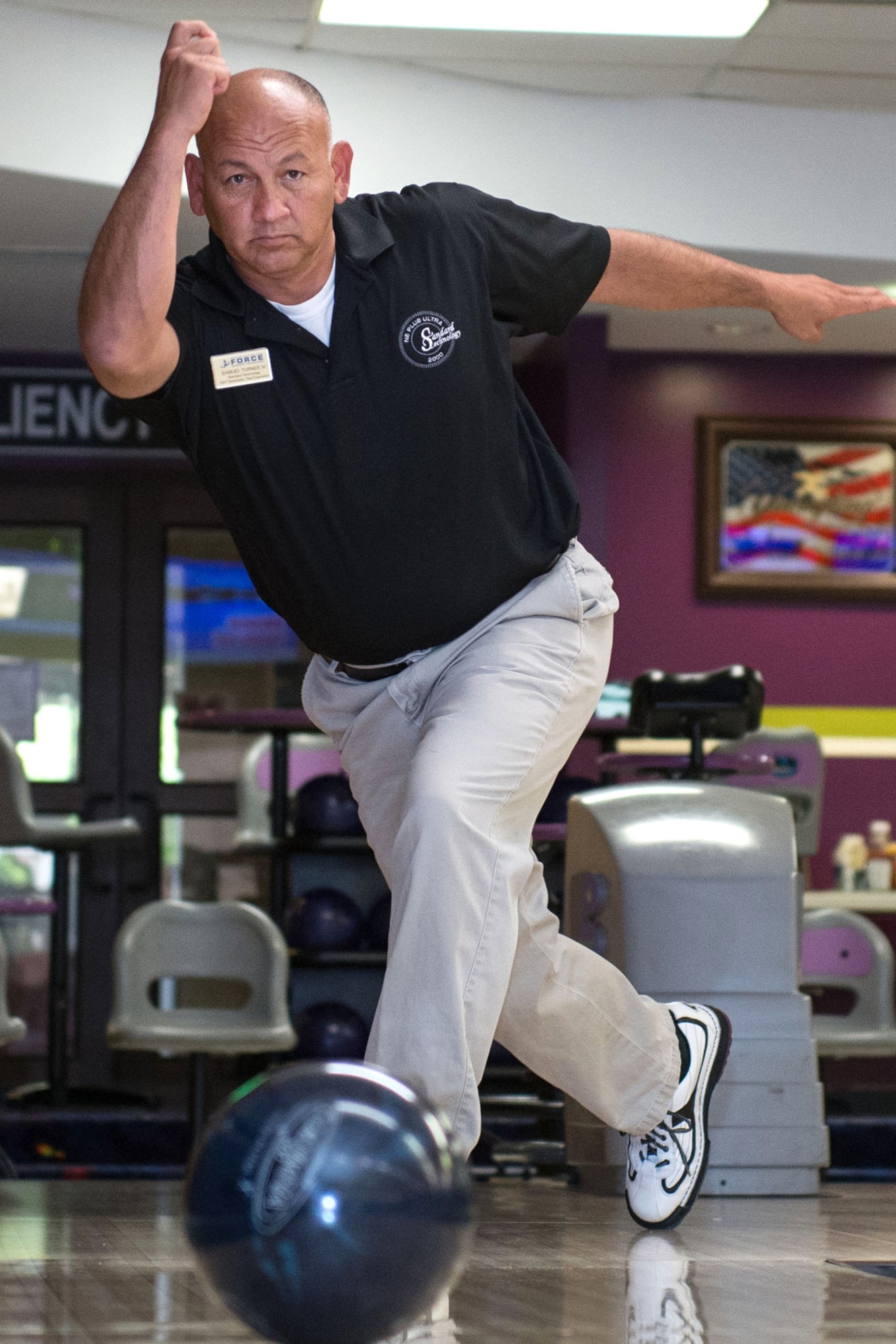 Samuel Turner, 66th Force Support Squadron Education and Training Center technician, practices his bowling technique at the Hanscom Lanes Bowling Center Aug. 28. Turner bowled a perfect 300 game and scored an 800 series last month during a base intramural bowling league game. The United Bowling Congress presented Turner with a ring to recognize his accomplishment. (U.S. Air Force photo by Mark Herlihy)