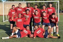 The Hurlburt Field Soccer Team pose for a group photo at the Aderholt Fitness Center Aug. 26, 2014. The team is scheduled to depart for Lackland Air Force Base, Texas to play their first game of the 2014 Department of Defense Soccer Tournament against the Hawaii Soccer Team. (U.S. Air Force photo/Senior Airman Kentavist P. Brackin)