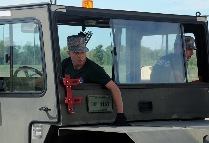 Staff Sgt. Joseph Webster, 2nd Munitions Squadron nuclear weapons maintenance team member, performs the weapons transport competition during the 2014 Global Strike Challenge on Barksdale Air Force Base, La., Aug. 27. The Global Strike Challenge is held to showcase the world's premier bomber and Intercontinental Ballistic Missile force, foster esprit de corps through competition and teamwork, recognize outstanding Air Force Global Strike Command personnel and improve combat capabilities. (U.S. Air Force photo/Staff Sgt. Sean Martin)



