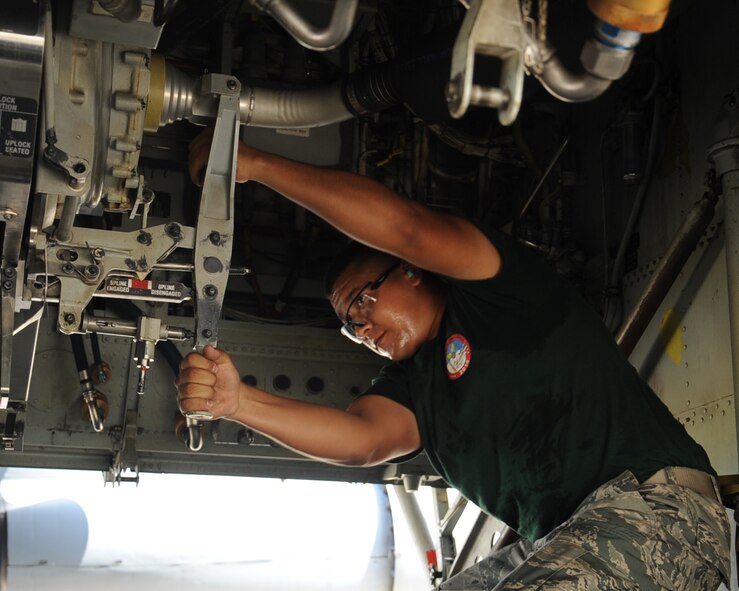 Senior Airman Anthony Rodriguez, 2nd Aircraft Maintenance Squadron weapons load team 2 man, secures AGM-86 Air Launch Cruise Missiles into the bomb bay of a B-52H Stratofortress during the 2014 Global Strike Challenge on Barksdale Air Force Base, La., Aug. 26. About 450 competitors take part in Global Strike Challenge competitions at various locations. Competitors include security forces along with missile, bomber and helicopter operational and maintenance forces. Teams have the opportunity to participate in innovative thinking, teamwork and esprit de corps that are central to the AFGSC mission. (U.S. Air Force photo/Staff Sgt. Sean Martin)